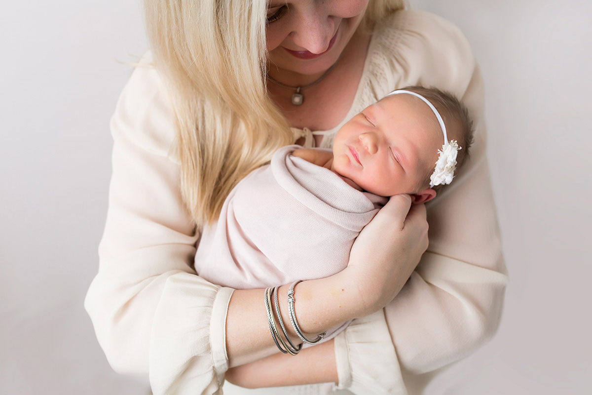 newborn photographer allen who photographs new mom and baby in a lifestyle session