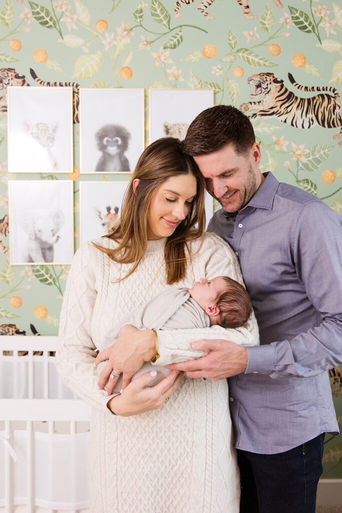 newborn picturesi n  plano taking gorgeous family photos in your nursery