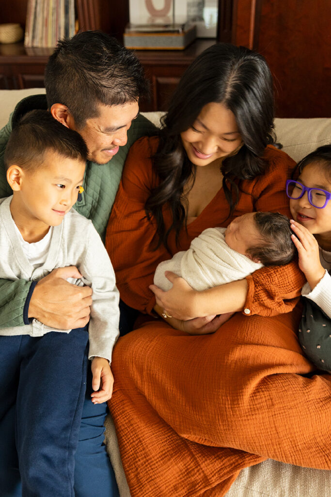 frisco newborn photographer taking family photos at your house