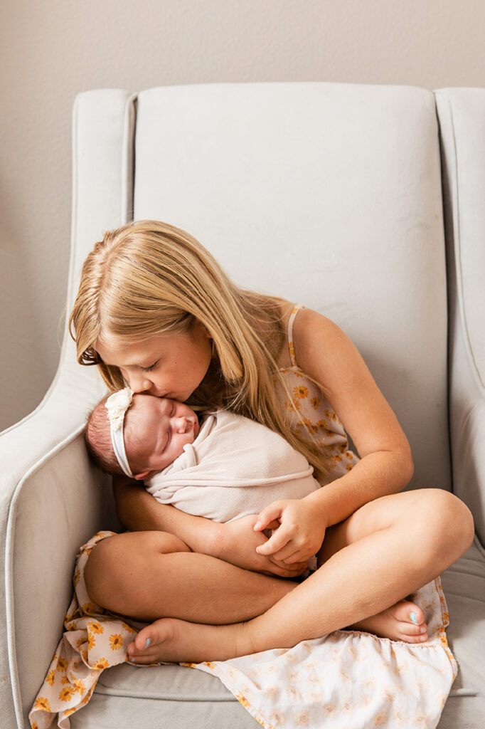 light and airy newborn prosper photo session with sister