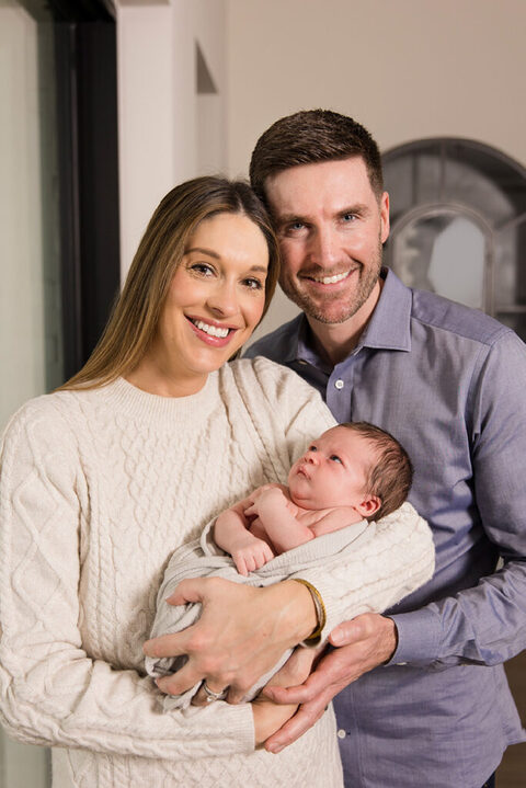 newborn photo dallas in your home with mom and dad