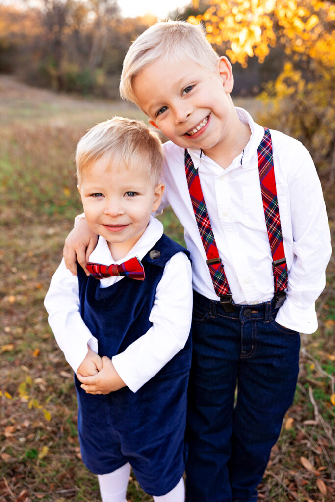north tx photographer taking fun photos of your kids at a field in Plano