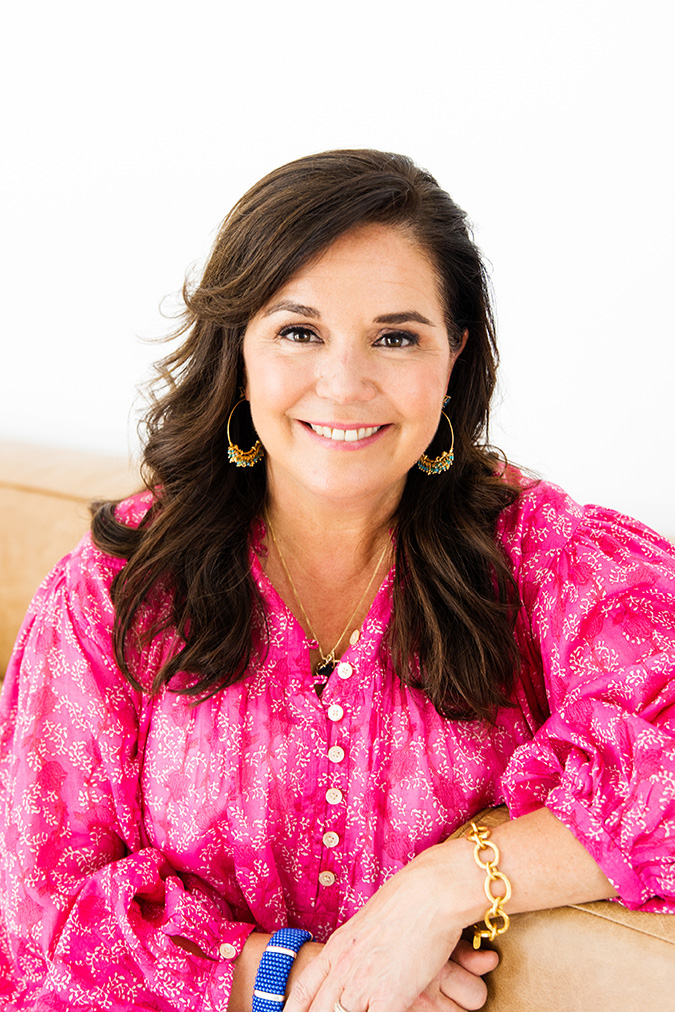 headshot photographer in dallas studio taking updated portraits or professional women