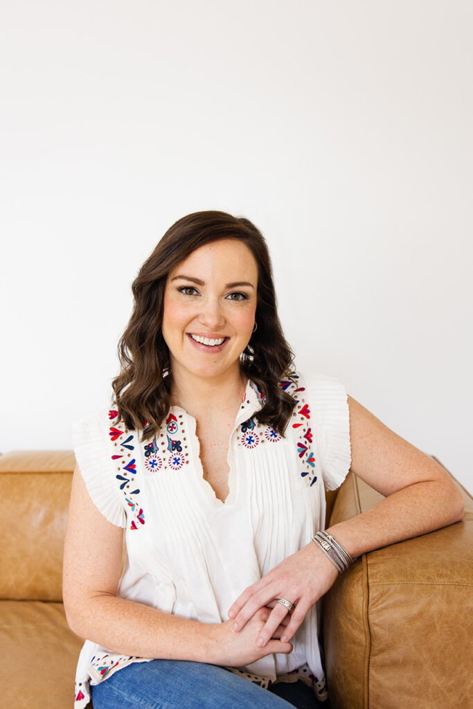 headshot photographer in dallas taking individual photos in studio at the Lumen Room