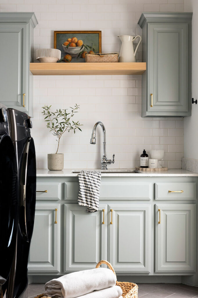 laundry room designed in dallas with white backsplash