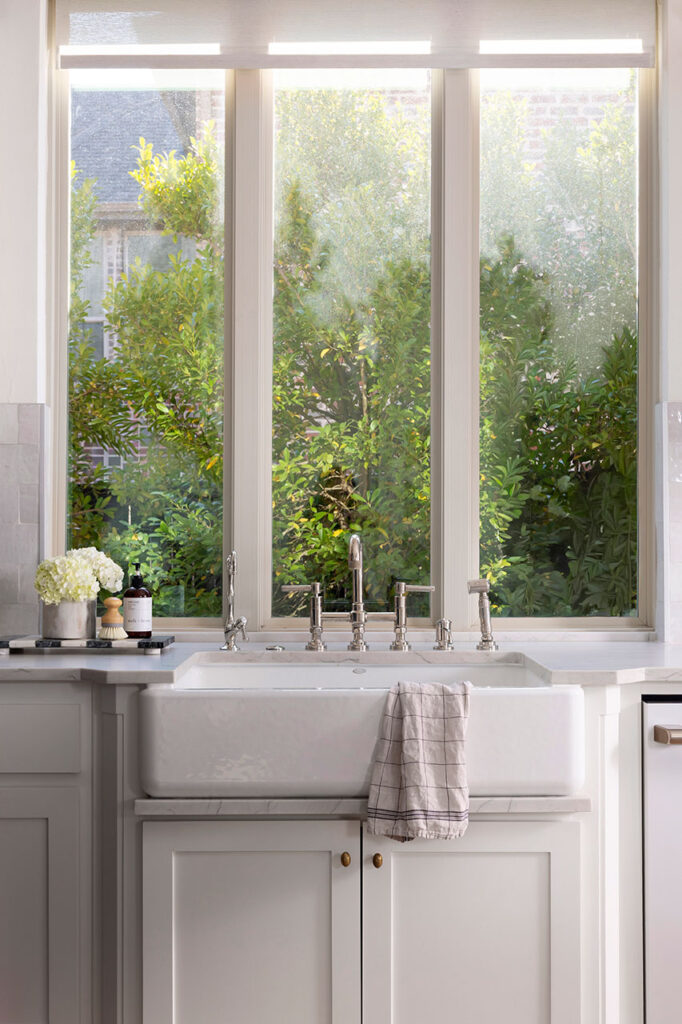 luxury white kitchen with farmhouse sink in Dallas