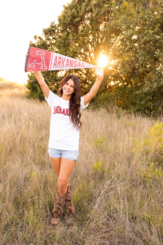 senior girl wearing college shirt