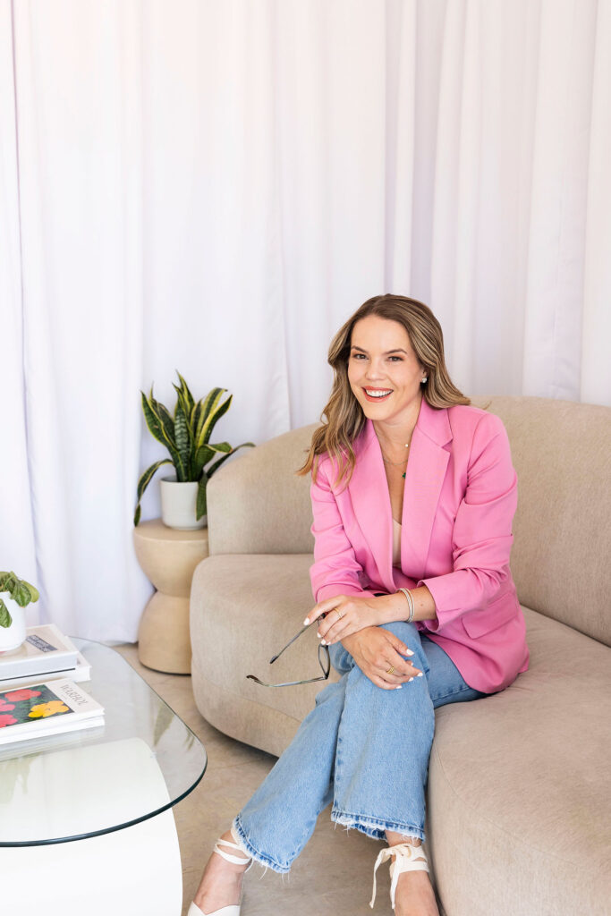 dallas brand photographer shooting in studio on a sofa