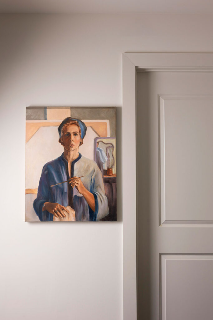 portrait hanging in a room
