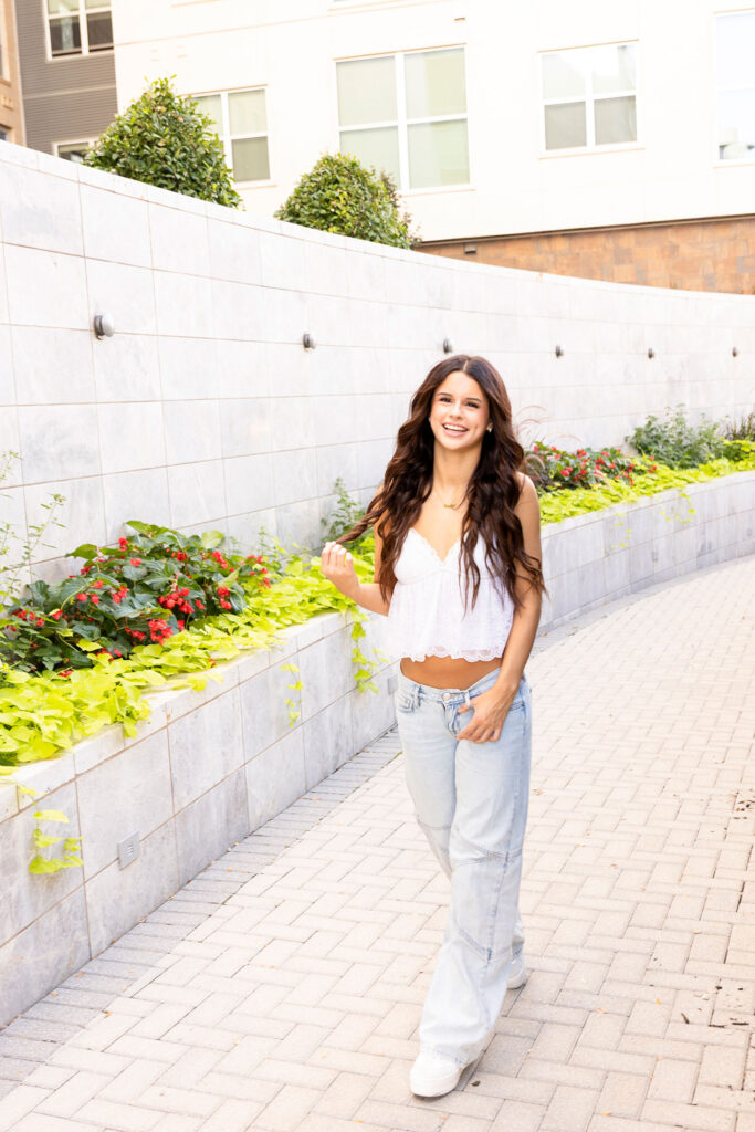 girl walking through west plano