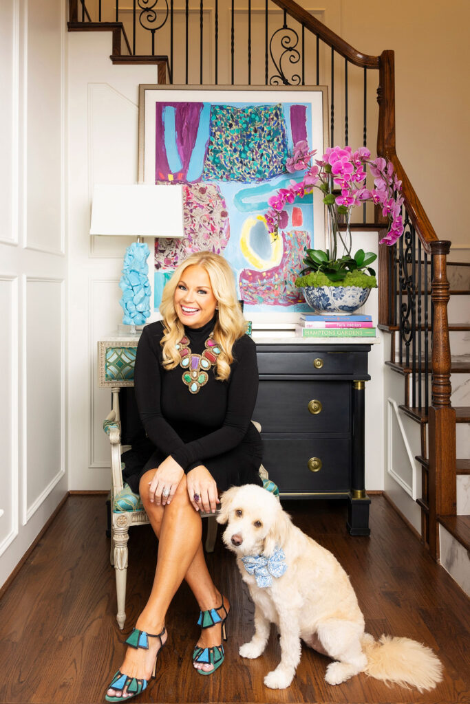 ibb head designer sitting with her dog