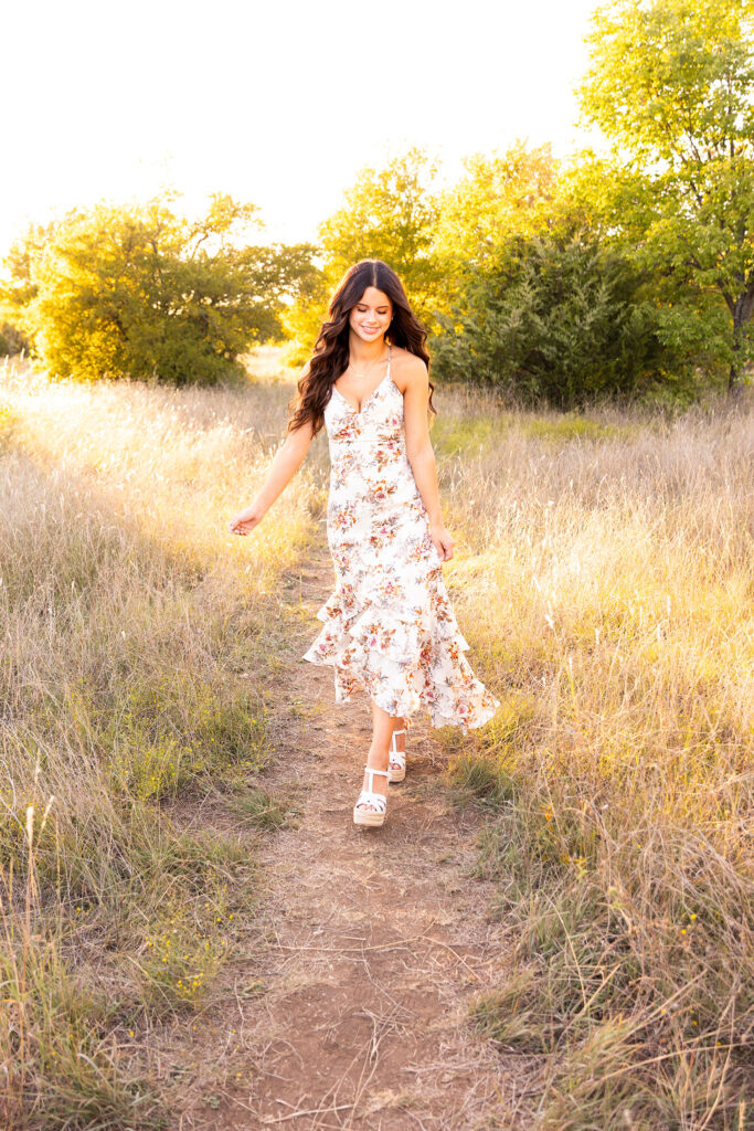 walking in a field at sunset