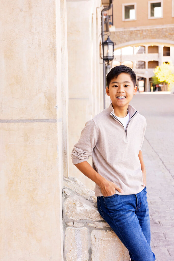 son smiling during fall pictures